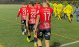 Los jugadores saltan al campo al inicio del Montilla-Egabrense(0-0)