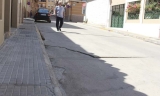 Firme con serios desperfectos en la calle Río Guadalquivir.